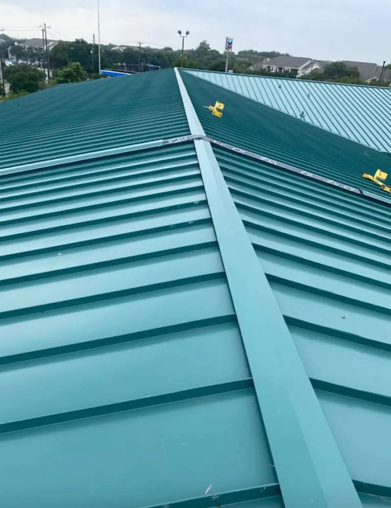 Green commercial metal roof ridge and valley for Metal Roof Repair in Weisenberg
